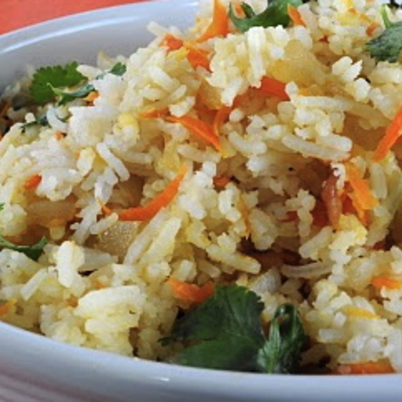 Рис припущенный с морковью