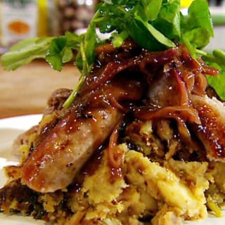 Bubble and squeak with sausage in onion gravy