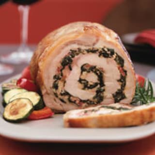 Spinach and Bacon Stuffed Pork Loin With White Wine & Rosemary Cream Sauce