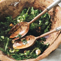 Arugula Salad with Caramelized Onions, Goat Cheese, and Candied Walnuts