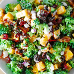 Broccoli salad with bacon, raisins, and cheddar cheese