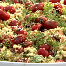 Couscous with grilled cherry tomatoes and fresh herbs