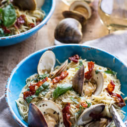 Fresh Clam Pasta with Creamy White Basil Sauce + Crispy Prosciutto.