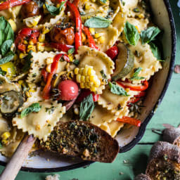 Garden Veggie and Ravioli Skillet with Pistachio Herb Butter.