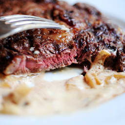 Grilled Ribeye Steak with Onion Blue Cheese Sauce