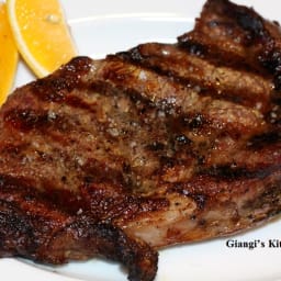 Grilled Thick Cut Ribeye Steak with Tomatoes and Radish Salad