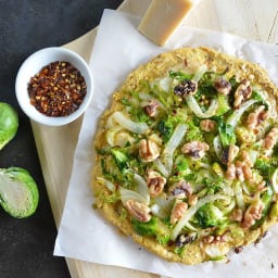 Herbed Chickpea Pizza with Brussels Sprouts, Caramelized Onion, and Walnuts