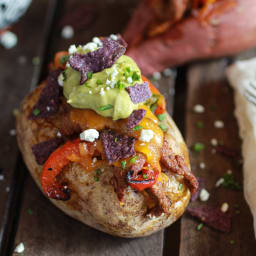 Steak Fajita Stuffed Baked Potatoes with Avocado Chipotle Crema