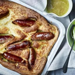 Toad in the hole with onion gravy and garlic cabbage