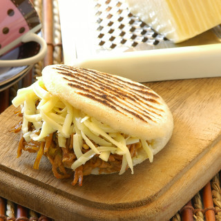 Arepa Filled with Shredded Beef & Yellow Cheese
