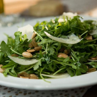 Arugula Salad with White Truffle Oil, Marcona Almonds and Shaved Parmesan