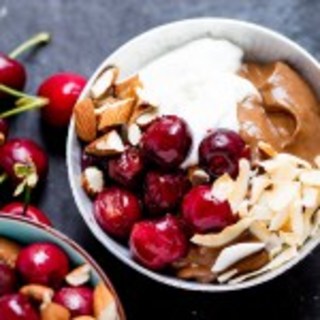 Avocado chocolate mousse bowl with roasted cherries