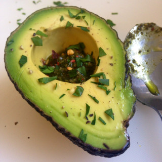 Avocado with Pesto and Red Pepper Flakes