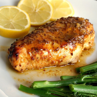 Baked honey mustard chicken breast with a touch of lemon