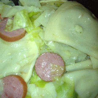Boiled Cabbage with pierogie and sausage