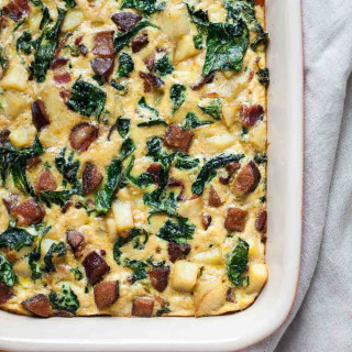 Breakfast Casserole with Bacon, Sausage, Sweet Potato, and Kale