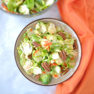 Brussel Sprouts Salad with Orange Ginger Dressing