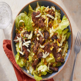 Chipotle Beef Taco Salad with Lime Pepitas, Corn &amp; Guacamole Dressing