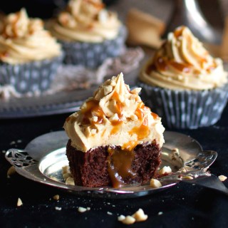 Chocolate Cupcakes with Peanut Butter Cream and Caramel Sauce