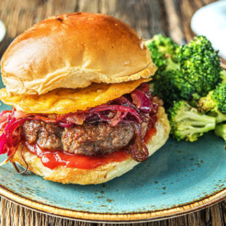 Crispy Frico Cheeseburgers with Caramelized Onion Jam and Roasted Broccoli