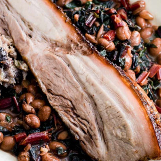 Dan Doherty's pork belly and quince with sage and black pudding stuffing, a