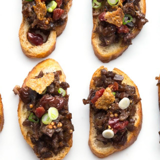 Duck Confit Crostini with Pickled Cherries and Duck Cracklings