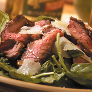 Filippo Berio Flank Steak Carpaccio-Style with Spinach and Shaved Parmesan