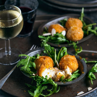 Goat Cheese Croquettes with Honey and Toasted Almonds