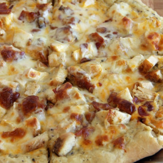 Grilled Chicken and Bacon Pizza with a Garlic Cream Sauce