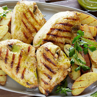 Grilled Chicken with Roasted Garlic-Oregano Vinaigrette and Grilled Fingerl