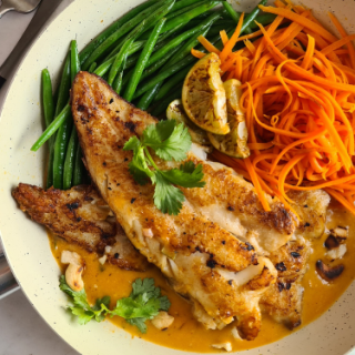 Grilled hake with Thai red curry sauce