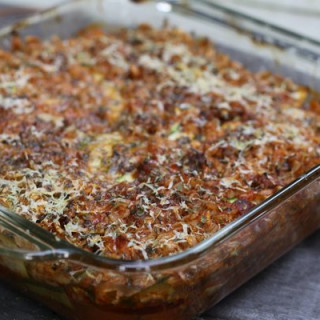 italian summer casserole: baked zucchini, brown rice and tomato sauce with 