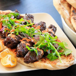 Kofte Kebabs With Spicy Harissa Yogurt Sauce and Grilled Flatbread (Minced 