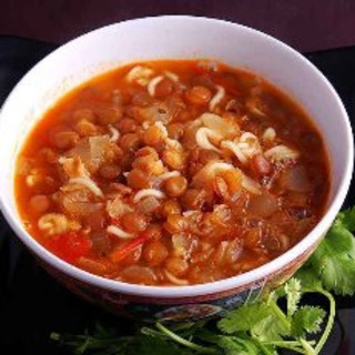 Lentil and Tomato Soup (Shawrabat 'Ada ma' Banadoora)