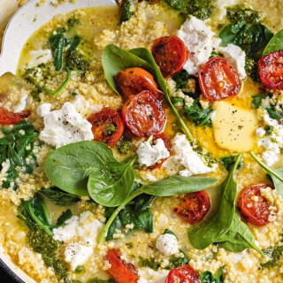 Millet risotto with pesto and blistered tomatoes