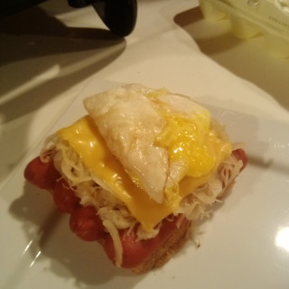 Open Faced Hot Dog w Sauerkraut and Cheese and Fried Eggs!
