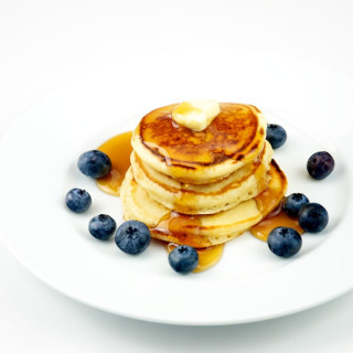 Pancakes with honey and blueberry