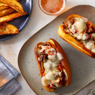Philly-Style Cheesesteaks with Roasted Potato Wedges