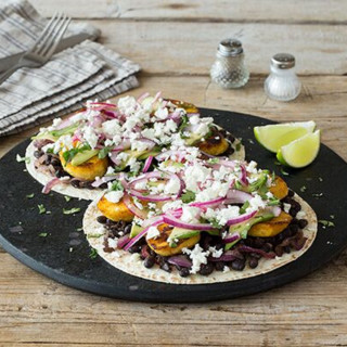 Plantain and Black Bean Tostadas with Pickled Red Onion, Avocado, and Feta