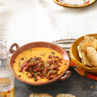 Queso Fundido with Roasted Poblano Peppers and Chorizo