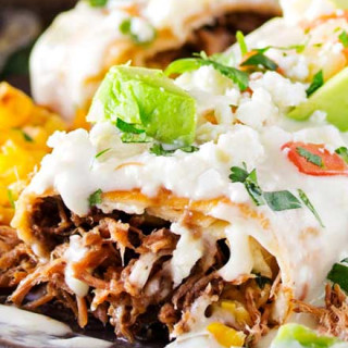 Queso-Smothered Beef Chimichangas