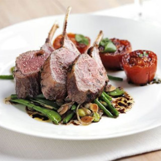 Rack of lamb with warm salad of mixed beans and slow-roast tomatoes