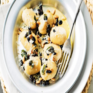 Ricotta Gnudi with pine nuts and currants