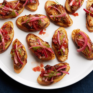 Roast Pork Belly Toasts with Blood-Orange BBQ Sauce and Pickled Red Onion