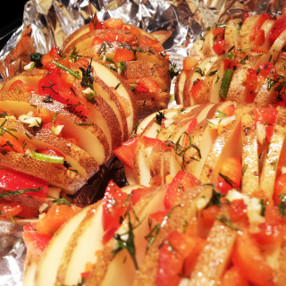 Sliced Baked Potatoes with Pepper and Garlic