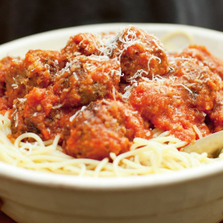 Spaghetti and meatballs with slow-roasted tomato and red wine sauce
