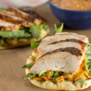 Spice-Rubbed Chicken Breast on Toasted Pita with Piquillo-White Bean Hummus