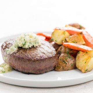 Steak with Garlic Chive Butterand roasted French-style potato salad