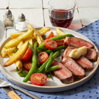Strip Steaks &amp; Garlic Butter with Oven Fries &amp; Tomato-Green Bean Sa
