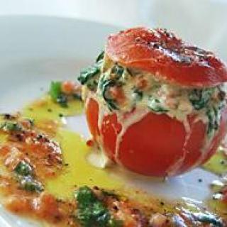 Stuffed tomatoes with mushrooms, parmesan and spinach